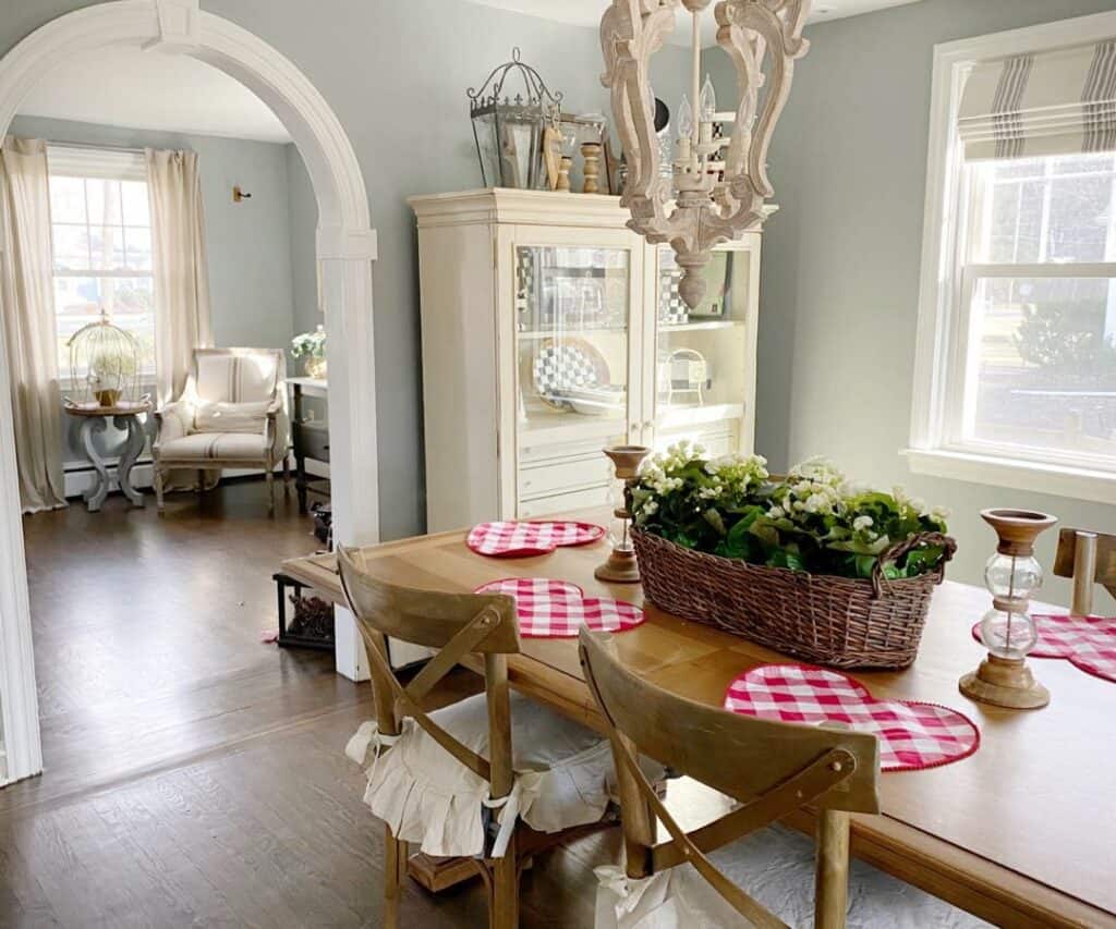 French Cottage Dining Table With a Floral Basket Centerpiece Soul & Lane