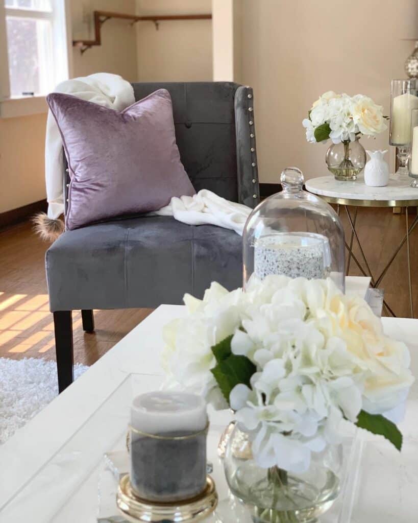 Fresh-cut White Flowers and Purple Chair