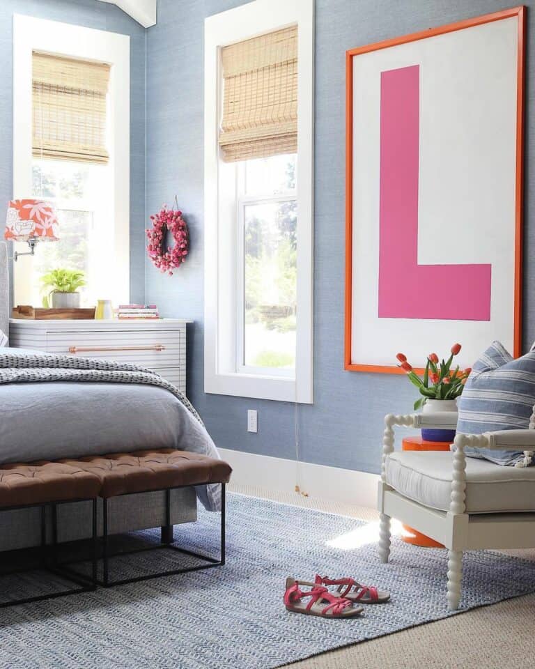 Girl's Bedroom With Pink Décor and Baby Blue Walls