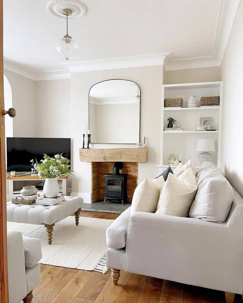 Glass Pendant Hangs Over Ottoman