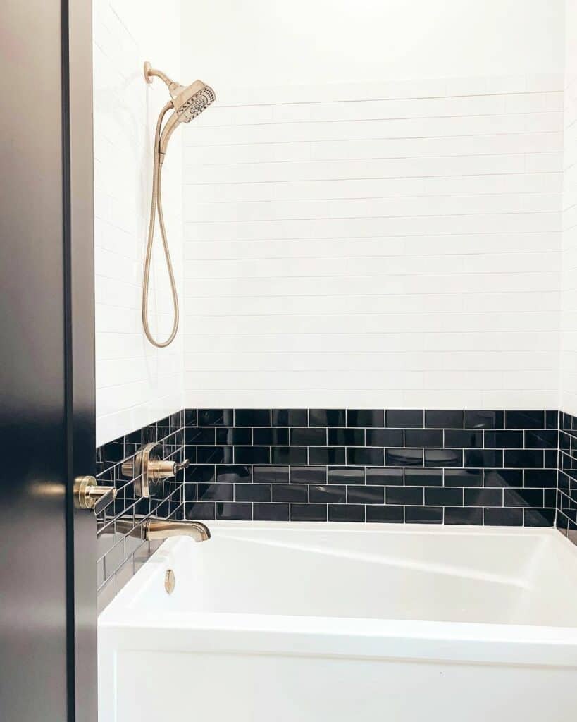 Gold Hardware in Black and White Bathroom