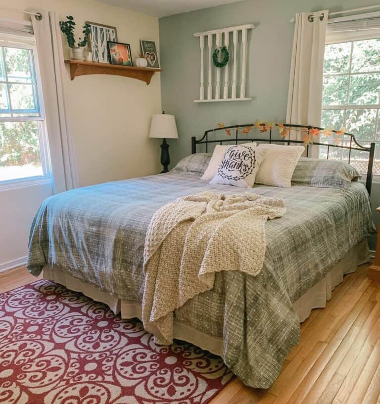 Gray Accent Wall Behind a Black Bed