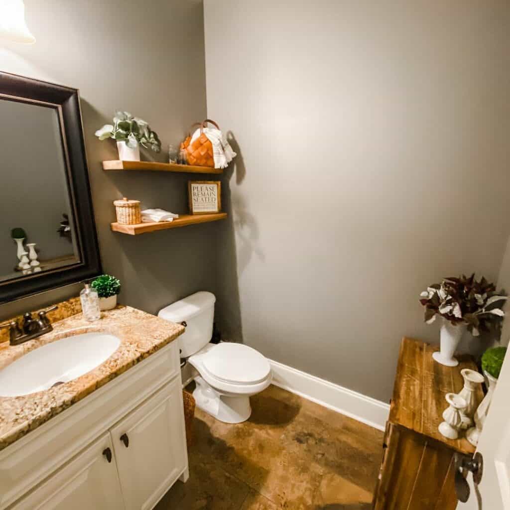 Gray Bathroom With Floating Shelves