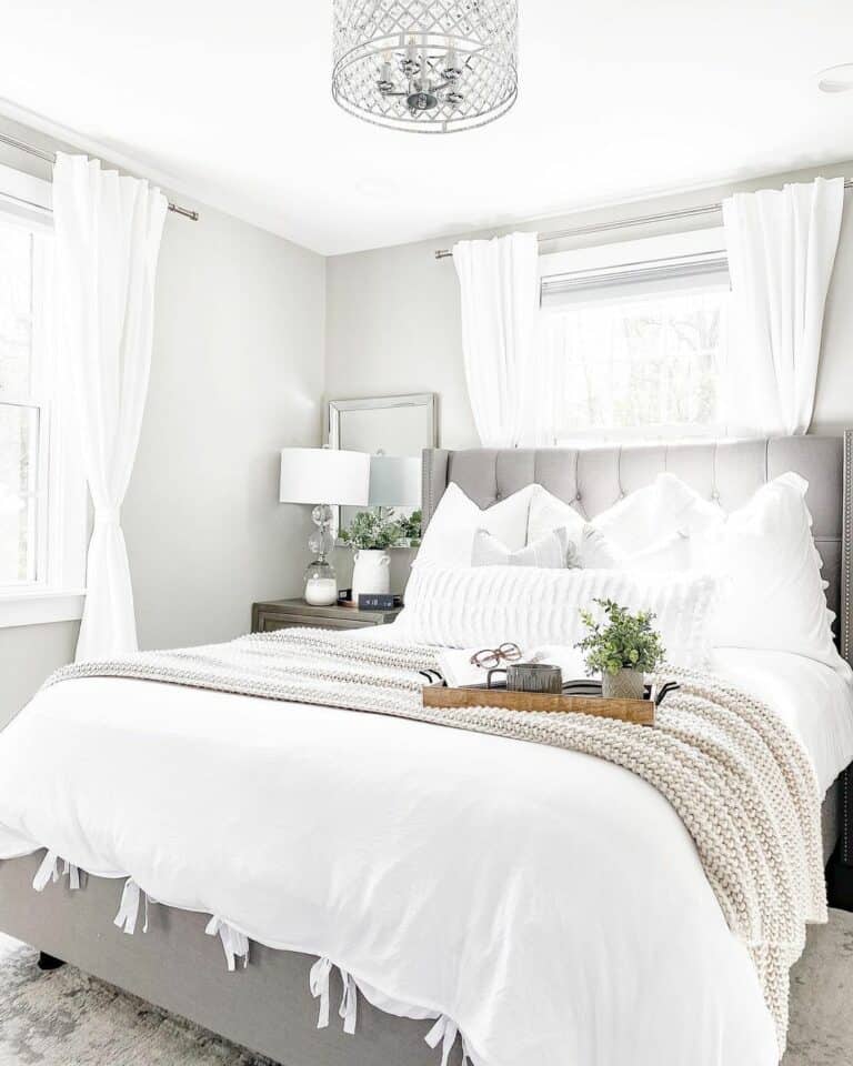 Gray Bedroom With White Window Curtains