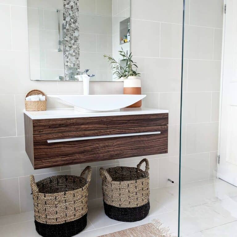Gray Tile Bathroom With Floating Wood Vanity