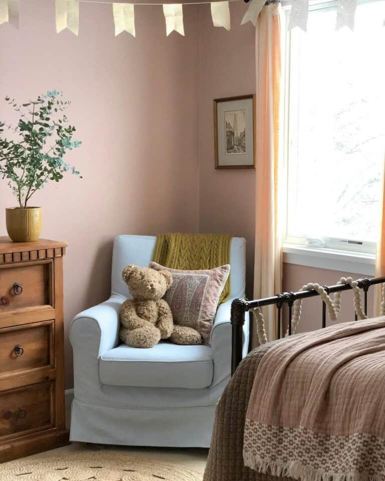 Light Blue Chair Complements Pale Pink Walls