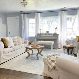 Light Blue Piano in Blue and White Living Room