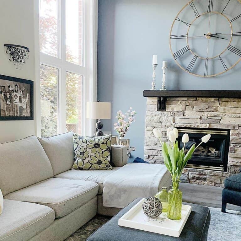 Light Blue Walls With Stone Fireplace