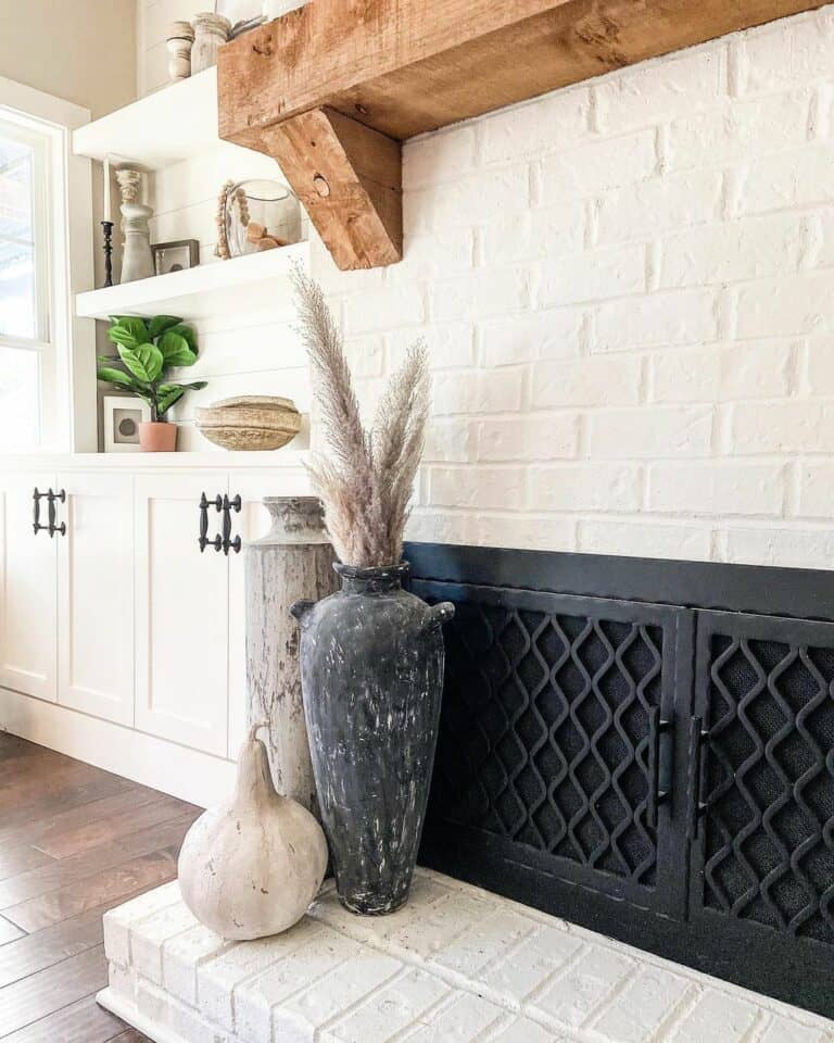 Living Room With White Brick Fireplace