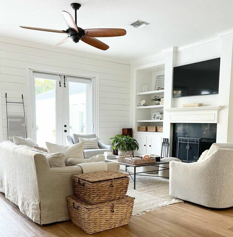 Living Room With a Modern Wood Ceiling Fan