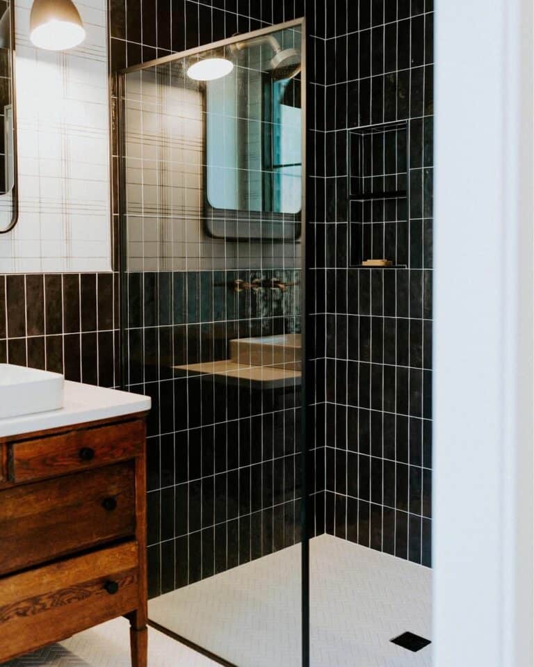 Long Vertical Modern Black Tiles on a Shower Wall