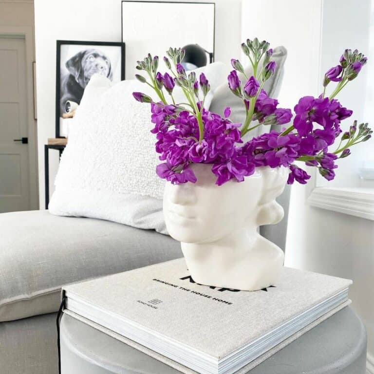 Marble Bust Fitted With Violet Flowers