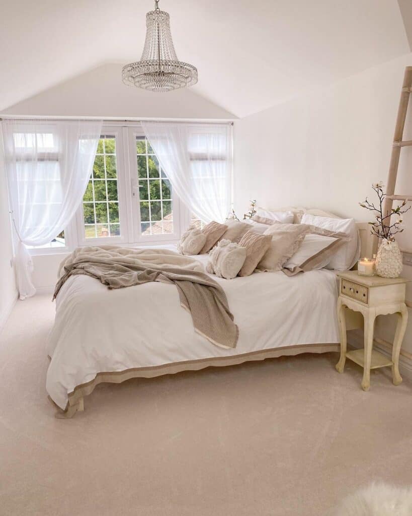 Master Bedroom With White and Beige Bedding