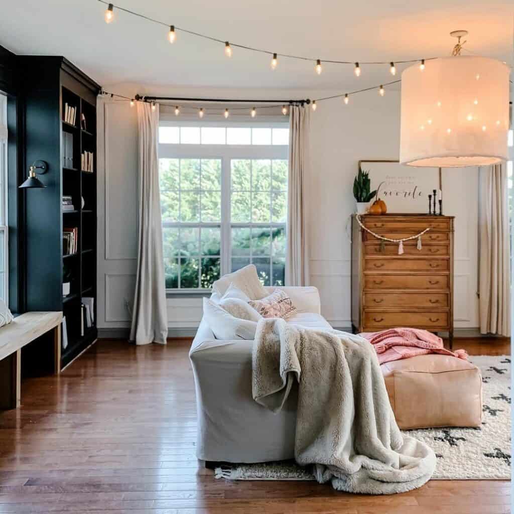 Modern Black Bookcase With Farmhouse Sconce Lights