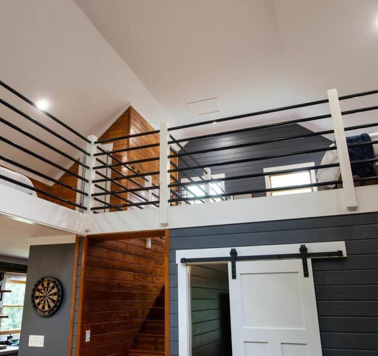 Modern Cabin With Deep Navy Blue Shiplap Walls