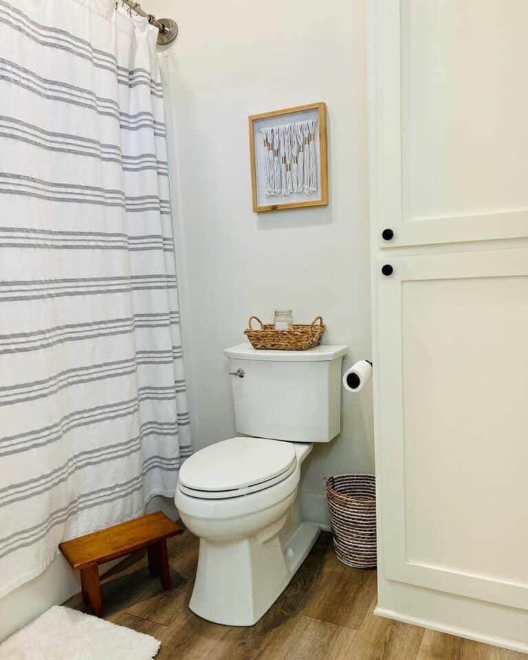 Modern Farmhouse Bathroom With Striped Shower Curtain