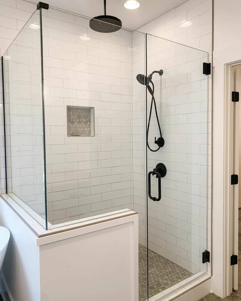 Modern Shower With Brown Hexagon Tile Flooring