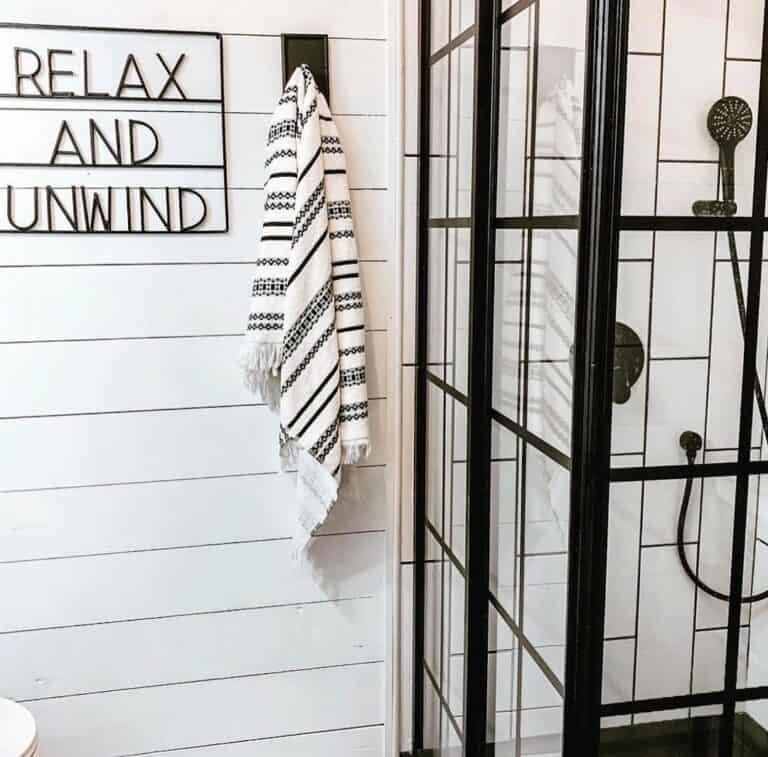 Monochromatic Bathroom With an Industrial-meets-Farmhouse Aesthetic