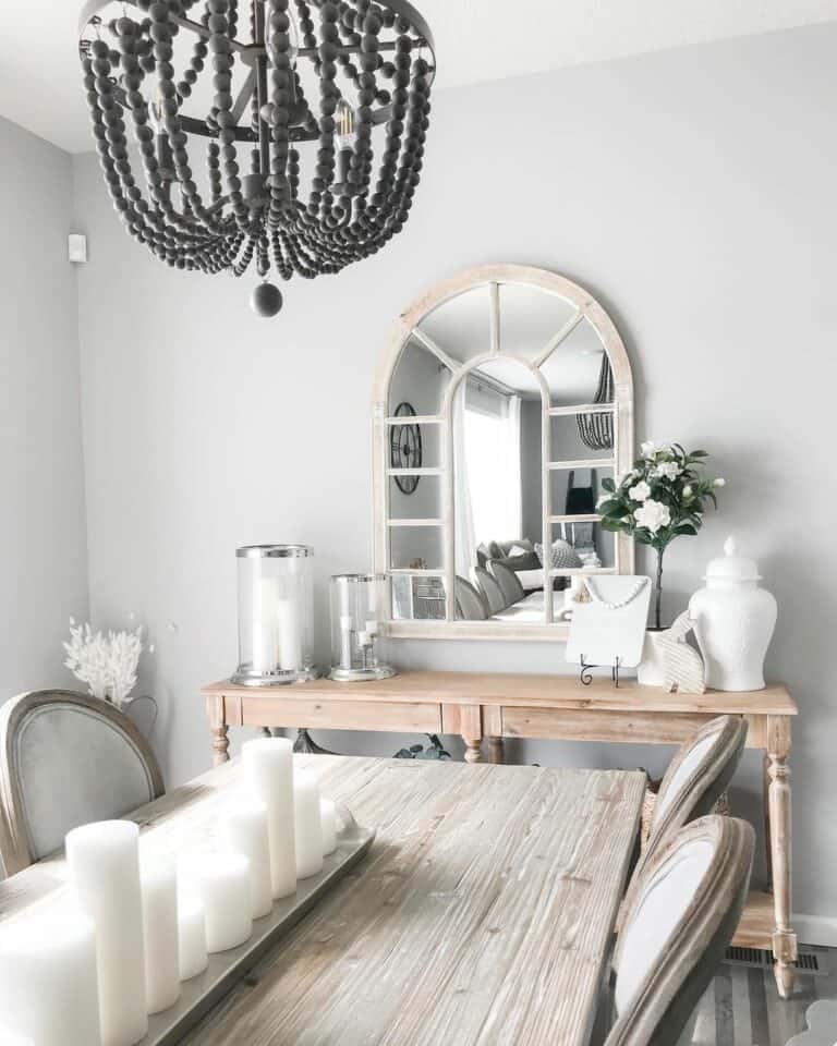 Muted Dining Room With Light Wood Furniture