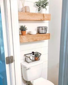 Natural Wood Shelves Against Accent Wall