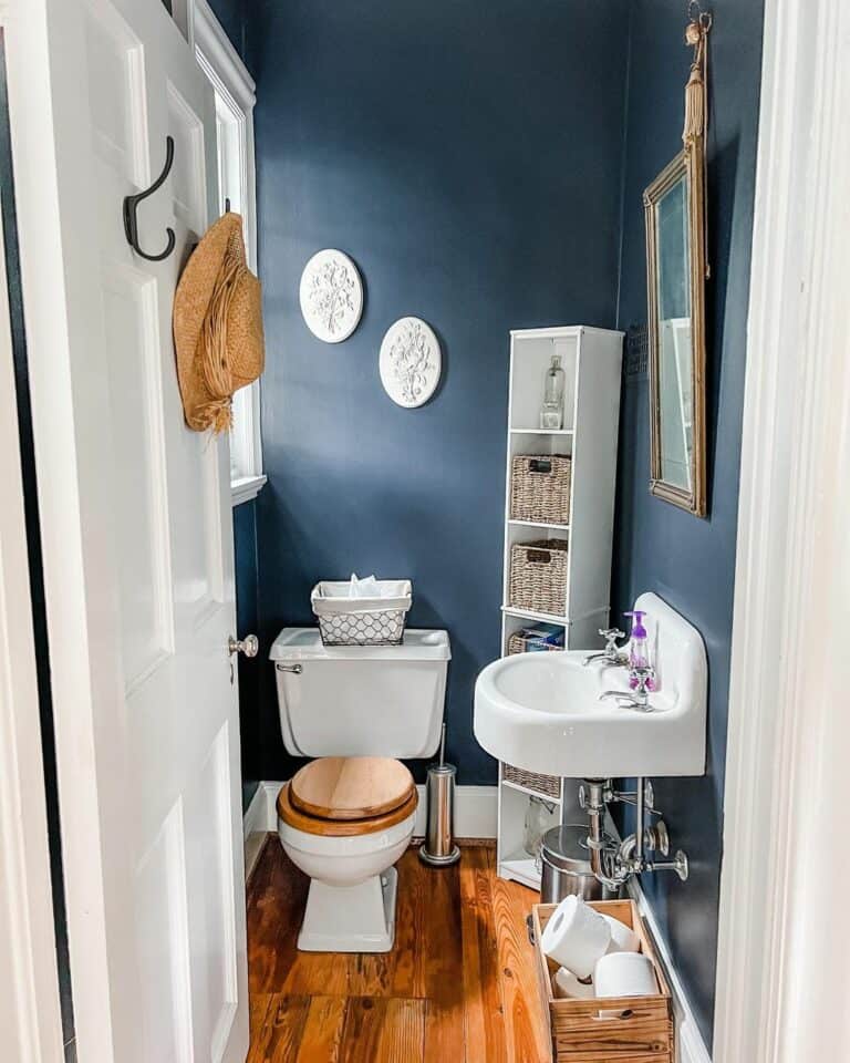 Navy Blue Bathroom With a Hint of Glamour