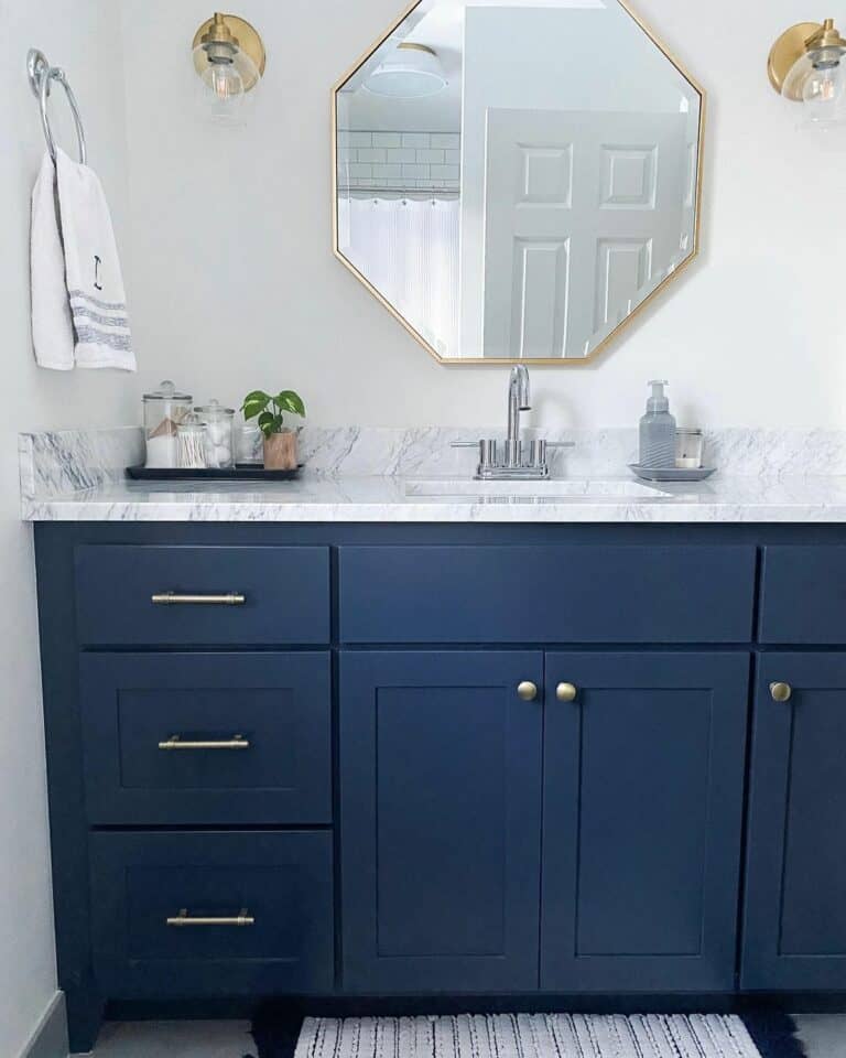 Navy Blue Cabinet With Gold Accents