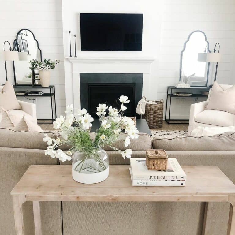 Neutral Living Room With Rounded Mirrors
