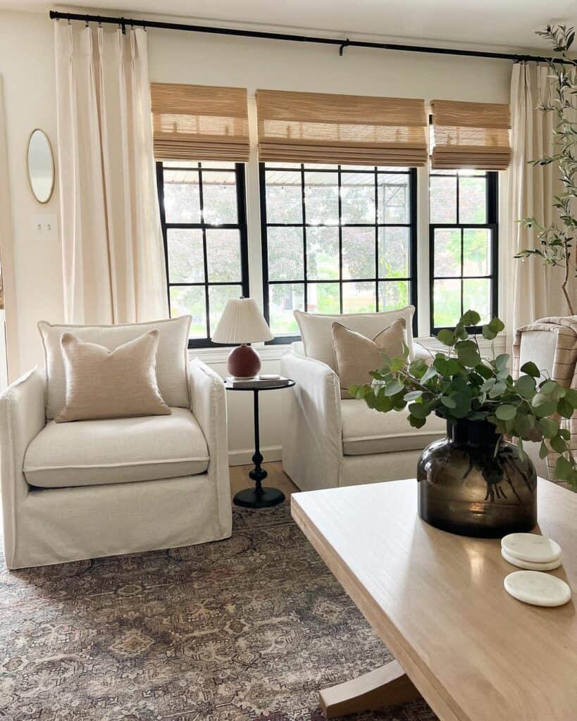 Neutral Living Room With White Slipcovered Chairs