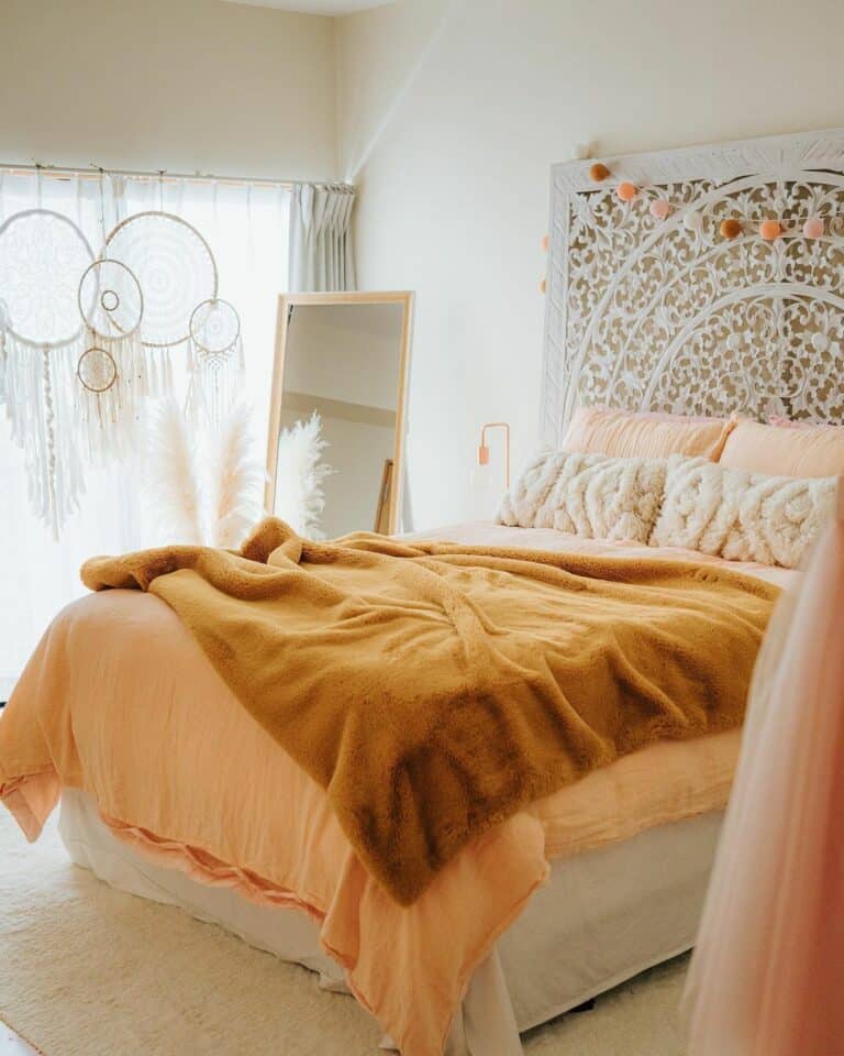 Orange Bedding Enriches a White Bedroom