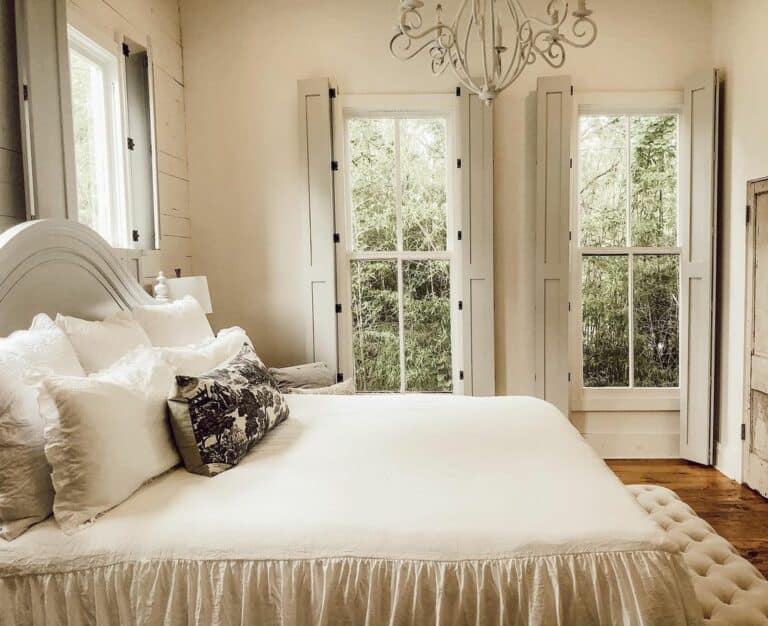 Paneled Shutters Cover Bedroom Windows
