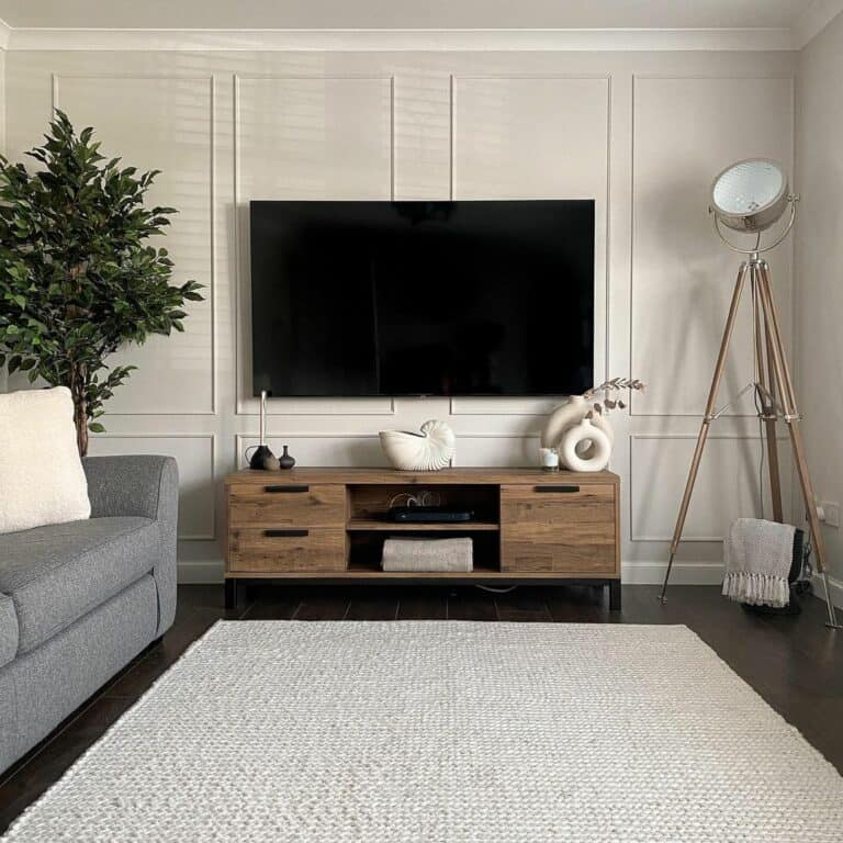 Paneled Wall Hosts an Entertainment Console