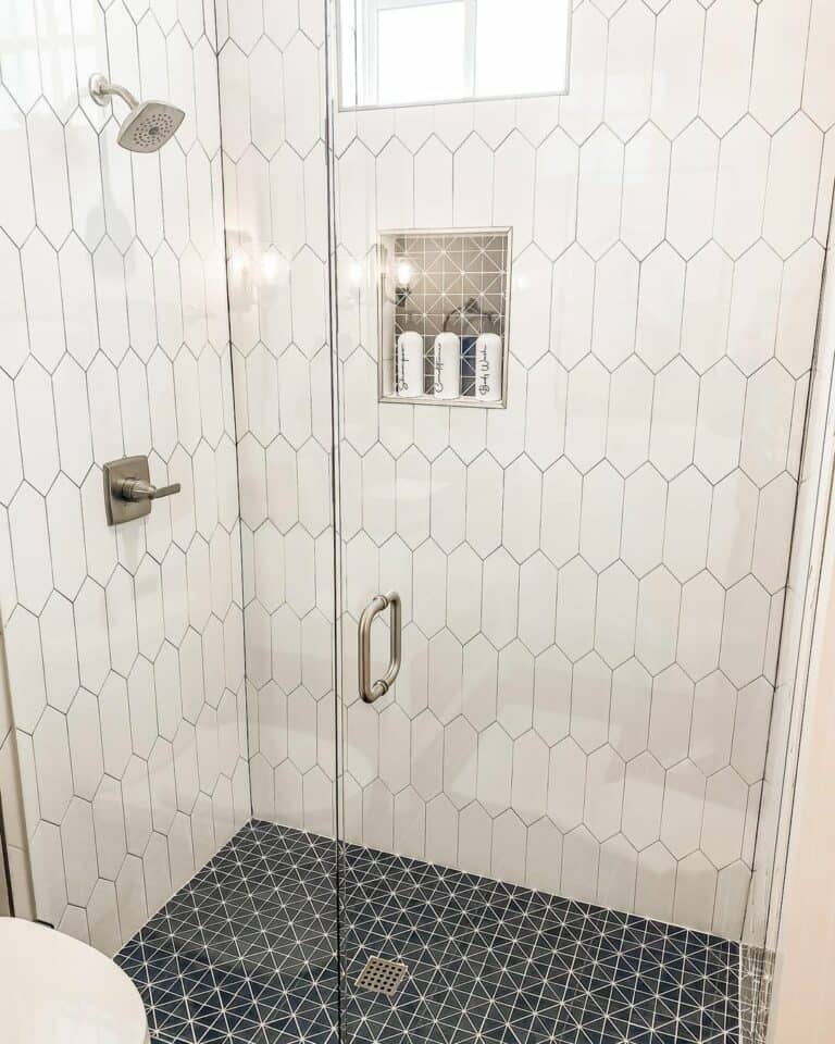 Pentagon Tiles With Black Tile Flooring in Shower