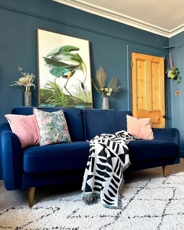 Pink and Green Accents in Blue Living Room