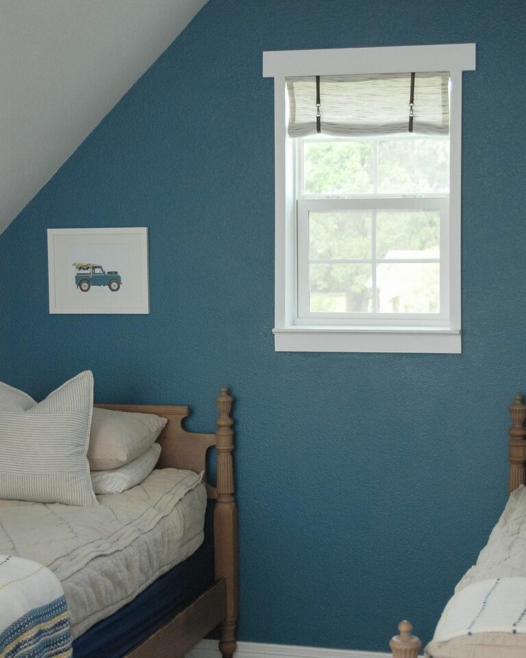 Serene Blue Walls in Cozy Small Bedroom