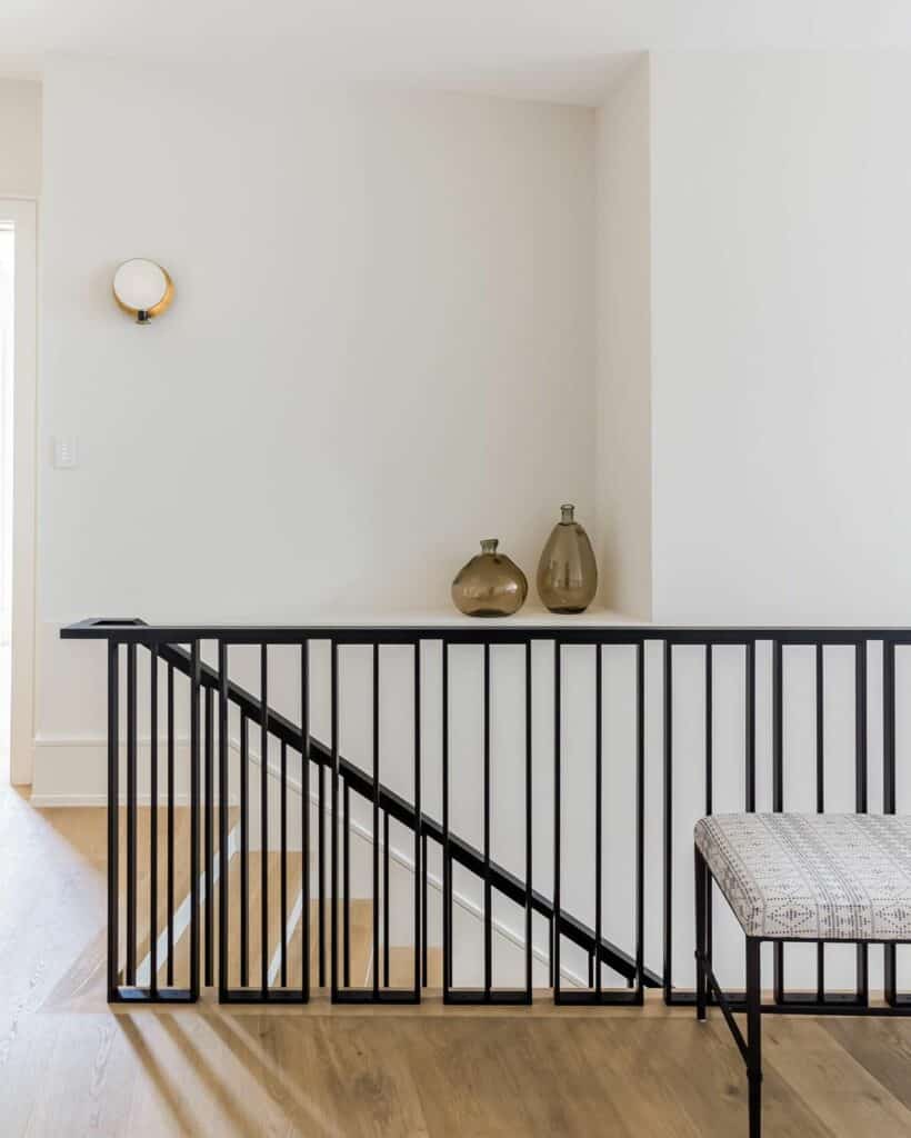 Simple Modern Space With Black Metal Railing