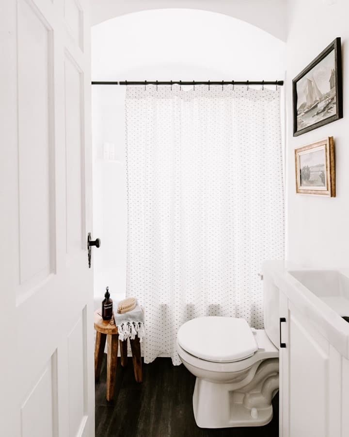 Simple Small Bathroom With Polka-dot Shower Curtain