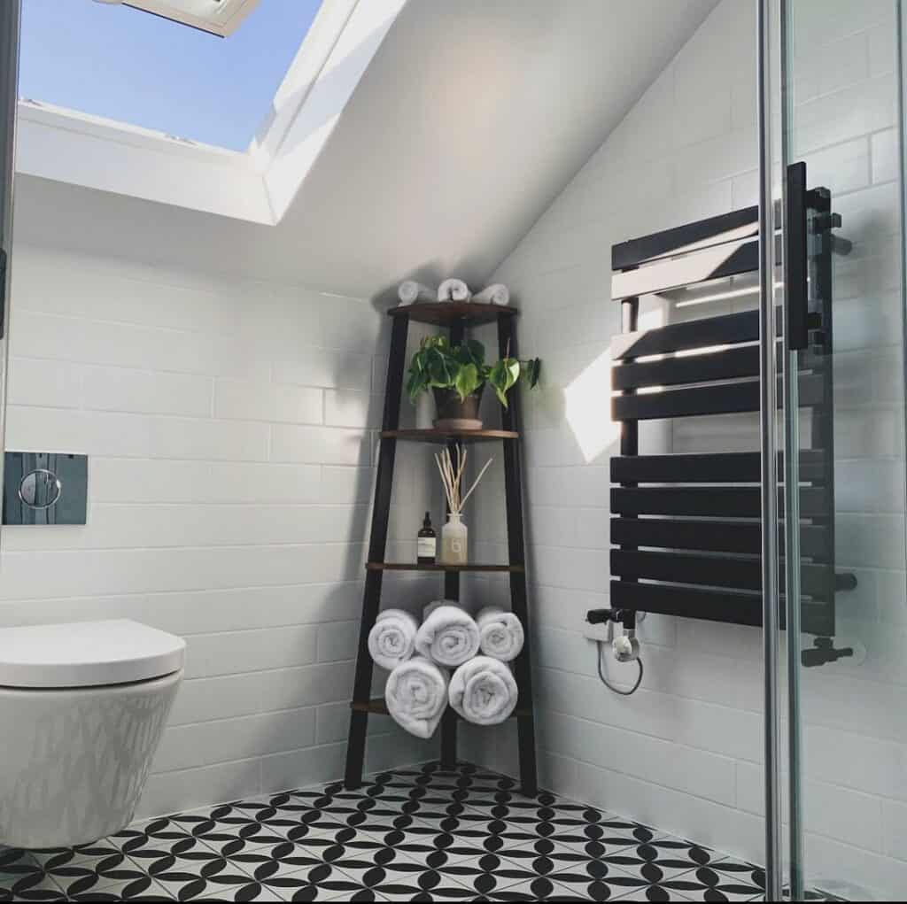 Slanted Ceiling Bathroom With a Skylight