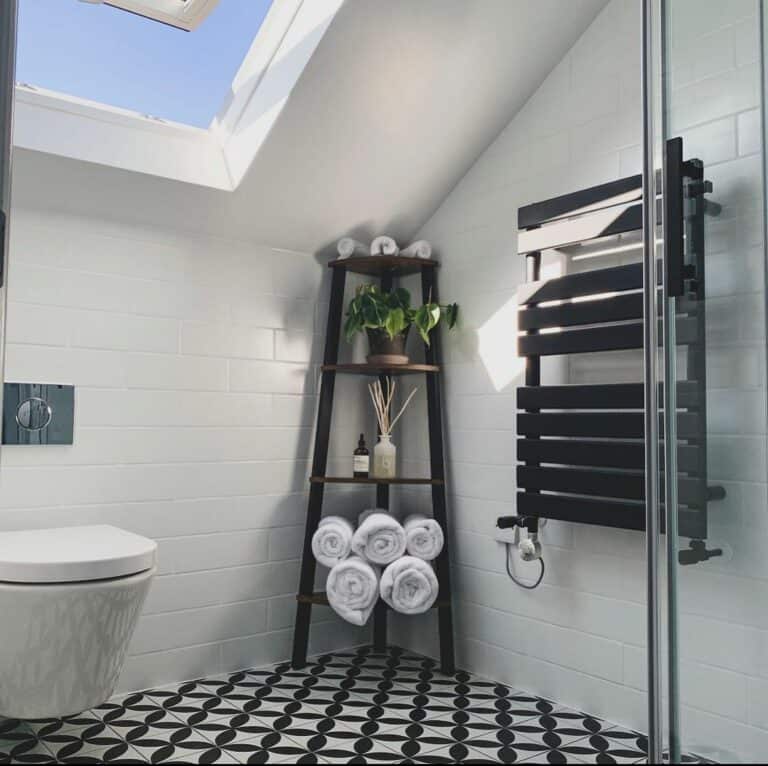 Slanted Ceiling Bathroom With a Skylight
