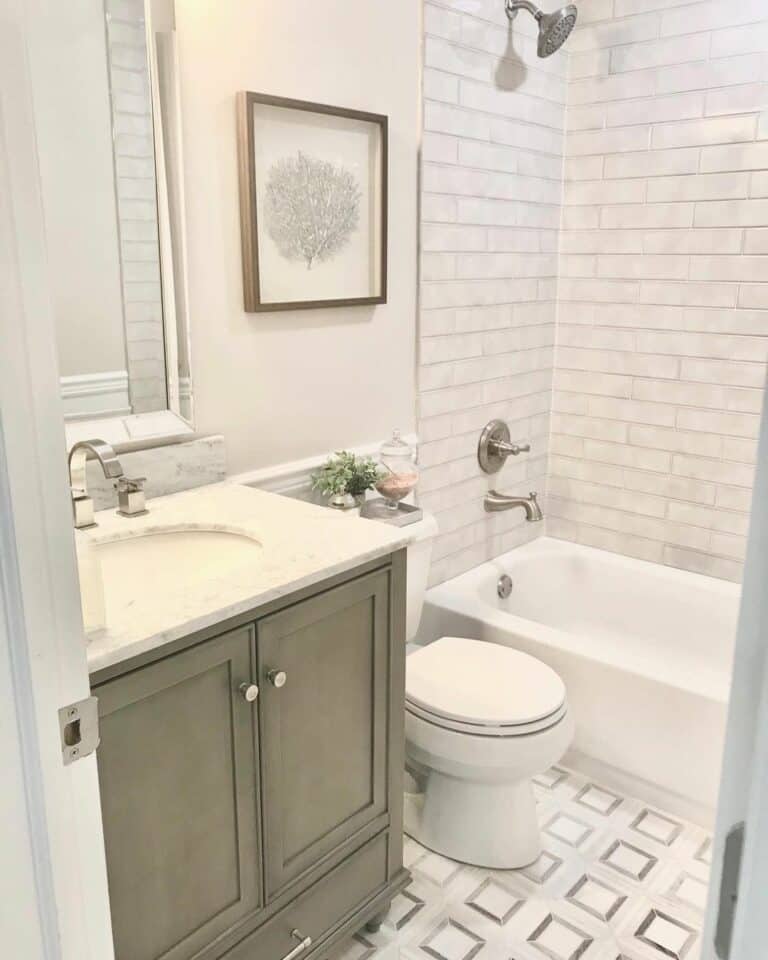 Small Bathroom With Gray and White Floor Tiles