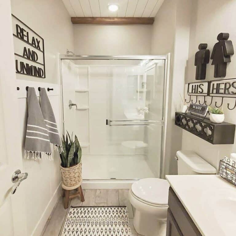 Small Beige Bathroom With Black Accents