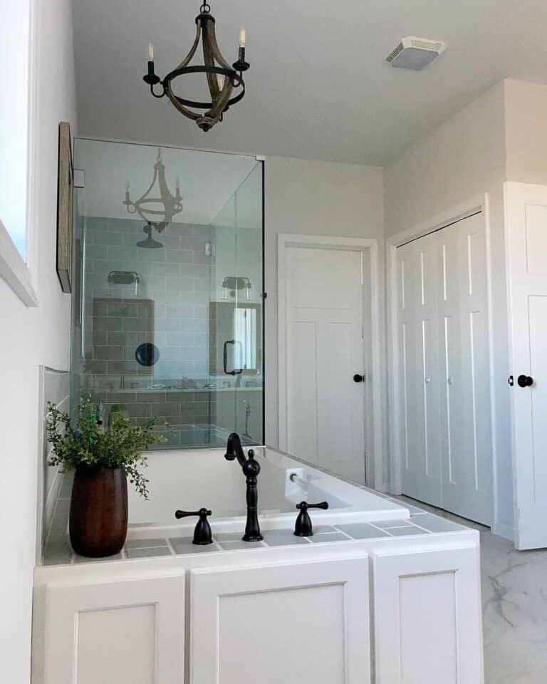 Spacious Bathroom With a Rustic Chandelier