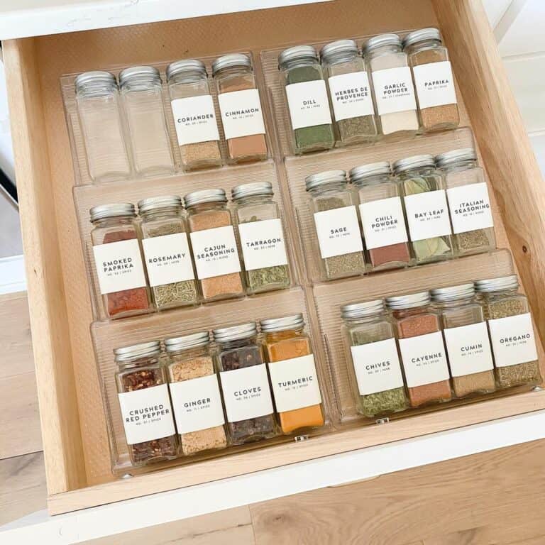 Spices Fill a Wooden Drawer Interior