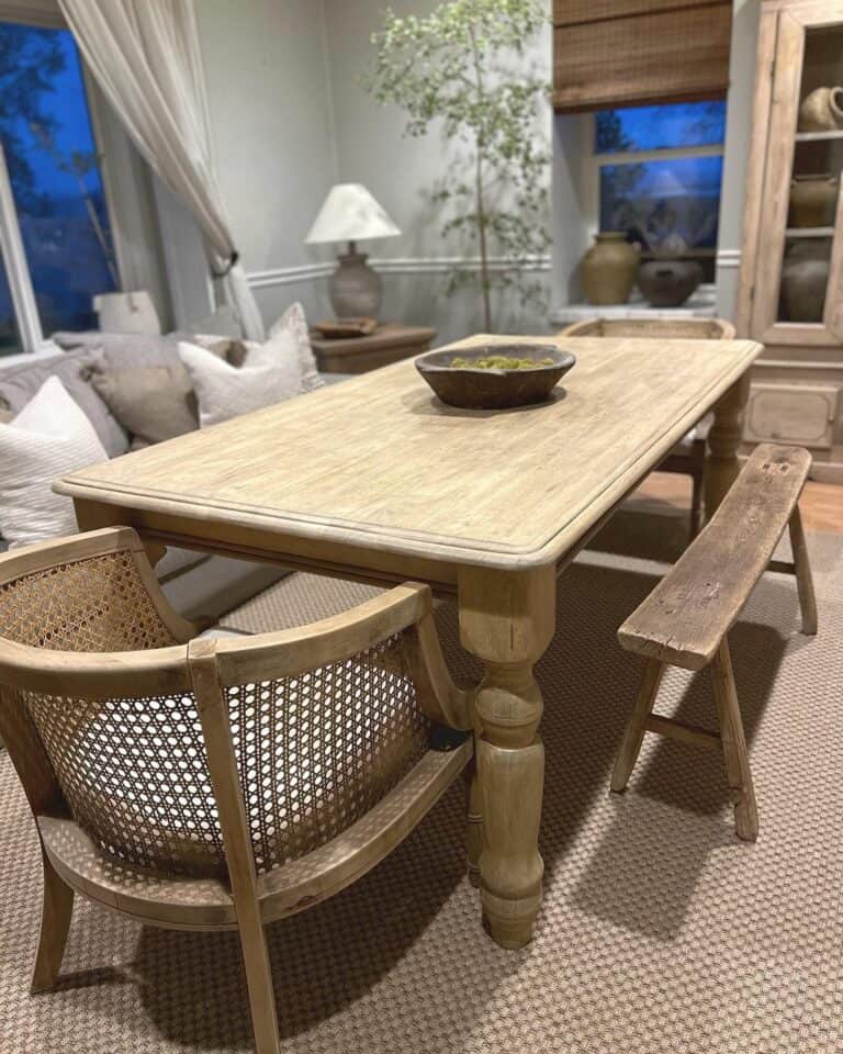 Stained Wood Dining Table With Cane Chairs