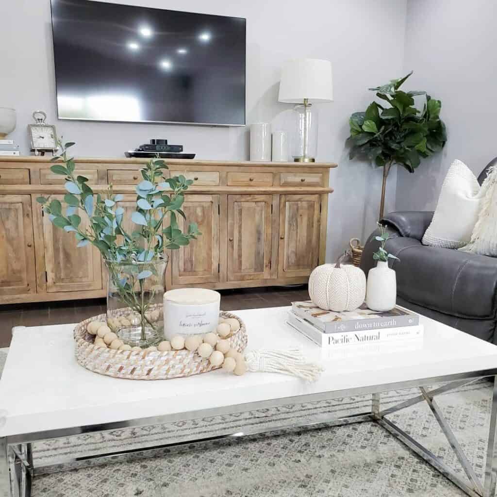 Stained Wood Media Cabinet With Table Décor