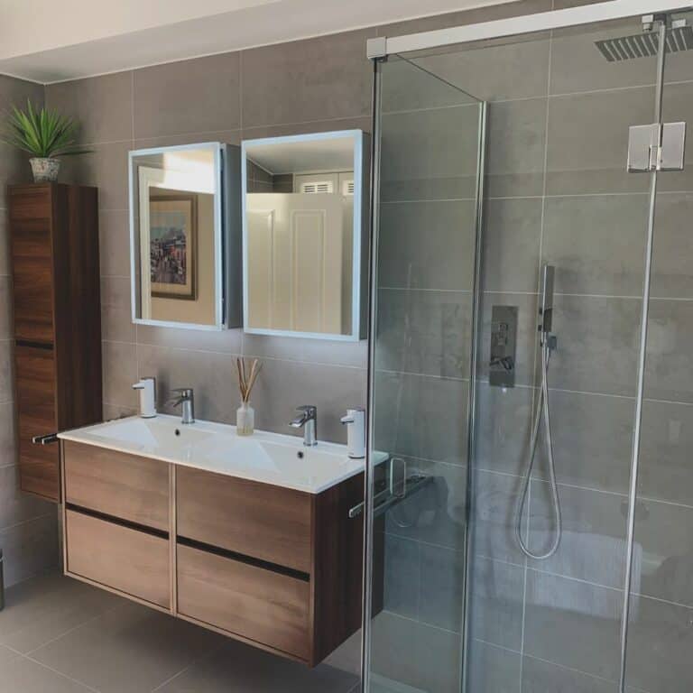 Taupe Tile Bathroom With Floating Wooden Vanity