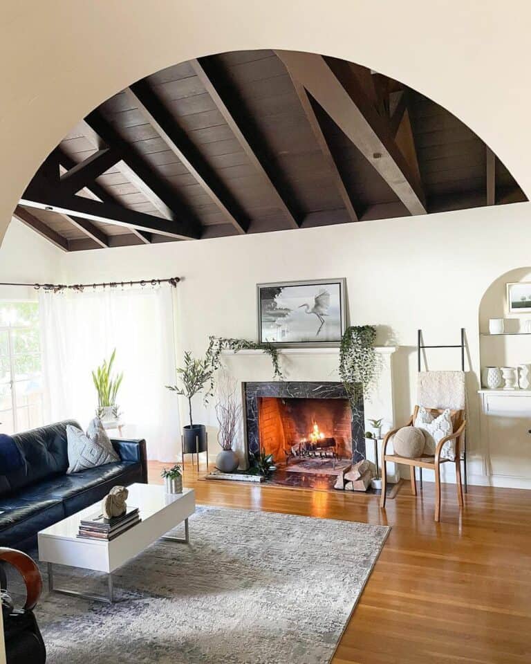 Trendy Living Room With Wood Paneled Ceiling