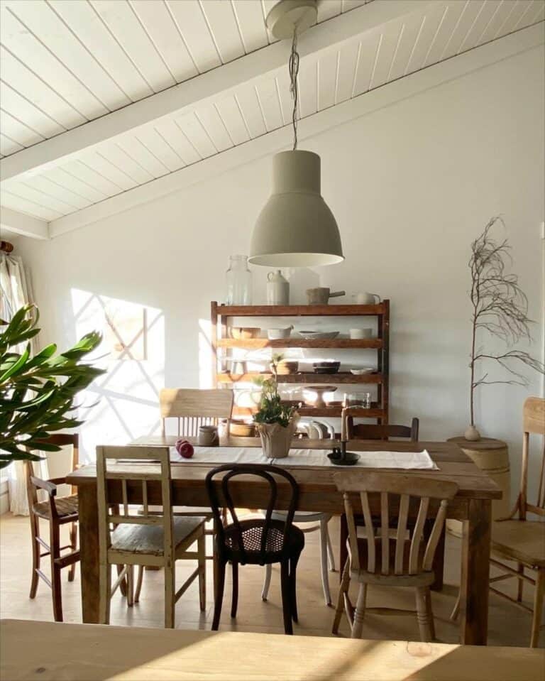 Varying Chair Styles Under a Contemporary Pendant Light