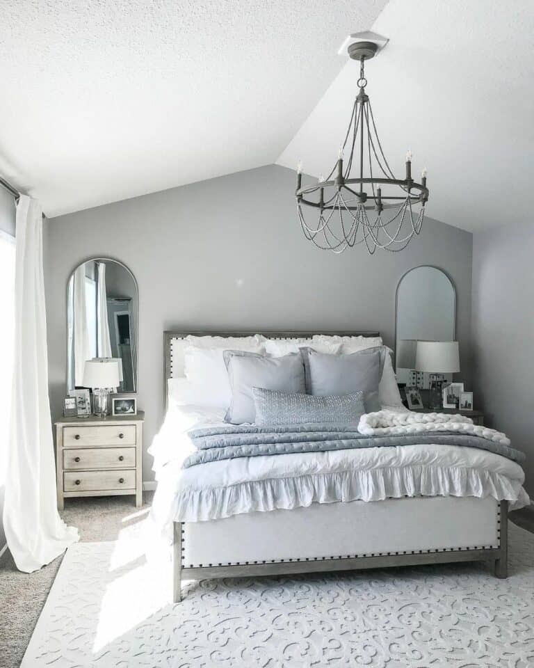 Vintage Chandelier Anchored Over Attractive Bedding