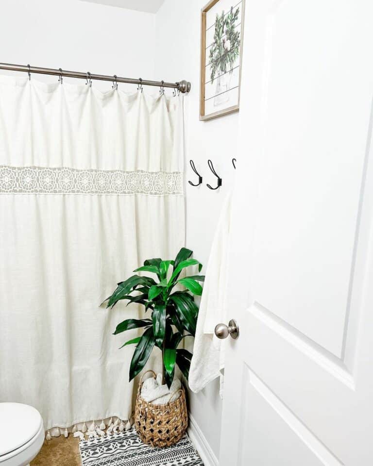 White Bathroom With Tassel Shower Curtain