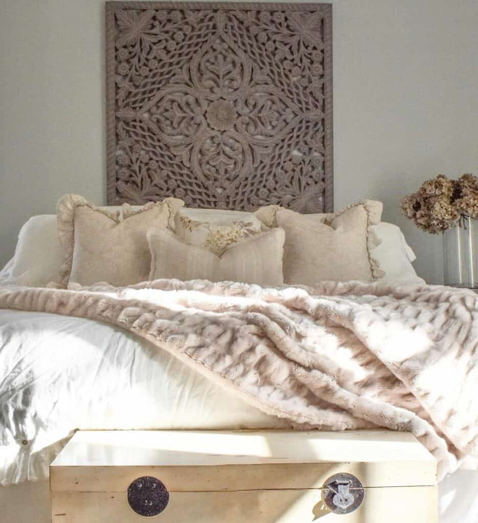 White Bed With Beige Throw Pillows